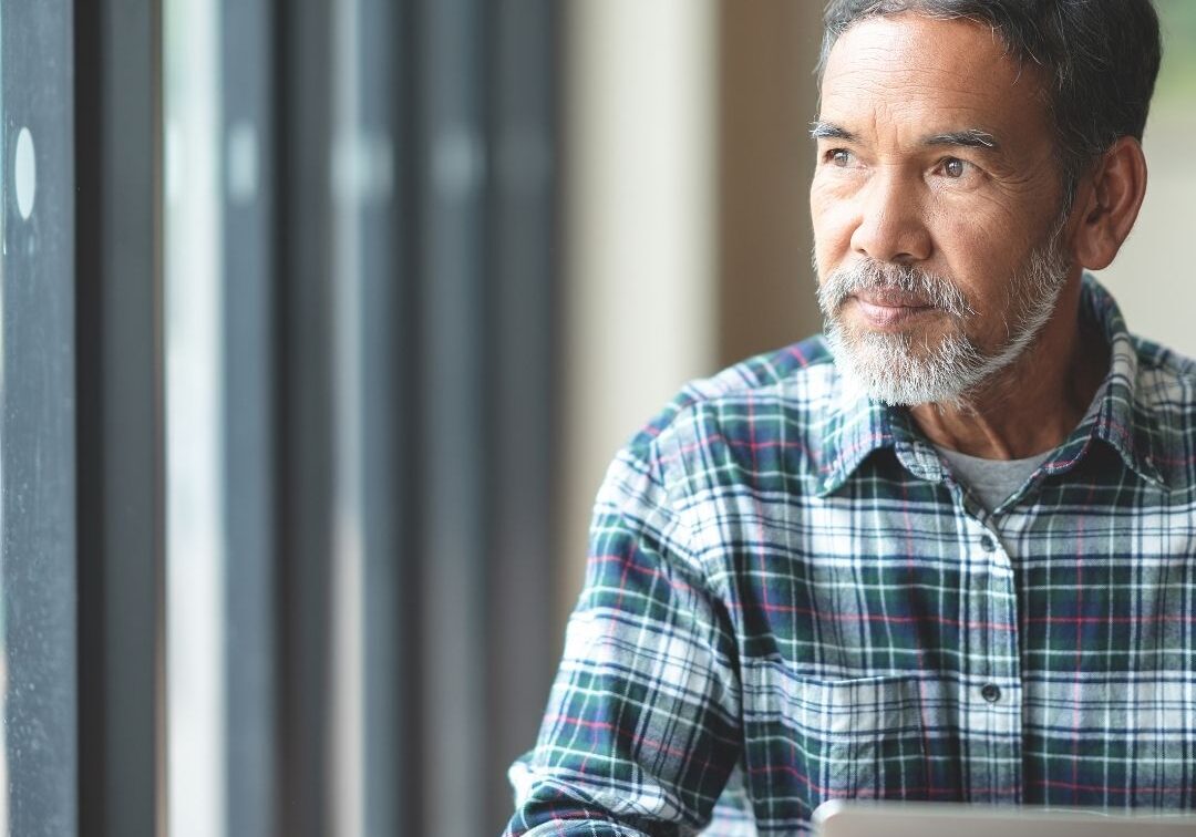 senior man using laptop